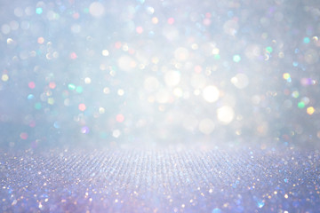 abstract glitter silver, gold , blue lights background. de-focused