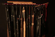 © goldeneden - Whips for BDSM on a dark background. Accessory for sexual games.
