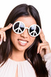 © Ranta Images - Happy woman wearing sunglasses with peace sign