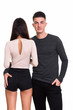 © Ranta Images - Studio shot of young couple with back view of woman