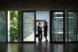 © Julia Otto und Florian Kuttler/Westend61 - Two businesswomen talking in office building