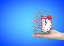 Alarm Clock Red On A Blue Background Explodes In The Girl's Hands