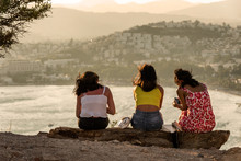 Girl Friends Enjoying Beautiful And Relaxing Sunset View On A Gumbet Bay. Bodrum. Mugla Province, Turkey