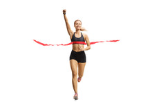 Young Female Runner On The Finish Line Of A Marathon Gesturing Happiness