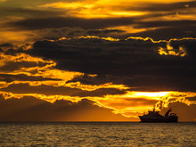 Fishing Ship In Iceland During Sunset