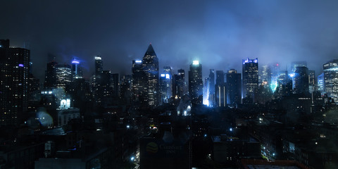 new york city at on a foggy night with lights glowing