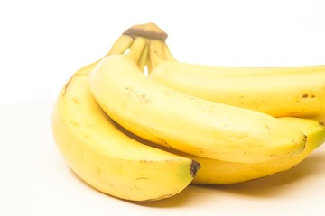 Wall Mural - Yellow fresh banana isolated against white, selective focusing