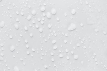 Fototapete - Raindrops on a grayish white background. Rainy season concept.