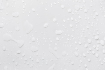Fototapete - Raindrops on a grayish white background. Rainy season concept.