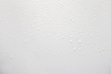Fototapete - Raindrops on a grayish white background. Rainy season concept.