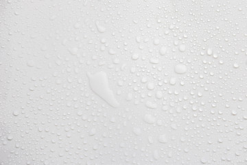 Fototapete - Raindrops on a grayish white background. Rainy season concept.