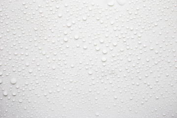 Fototapete - Raindrops on a grayish white background. Rainy season concept.