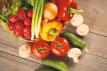 Wall Mural - Vegetables . Fresh Bio Vegetable in a Basket. Over Nature Background