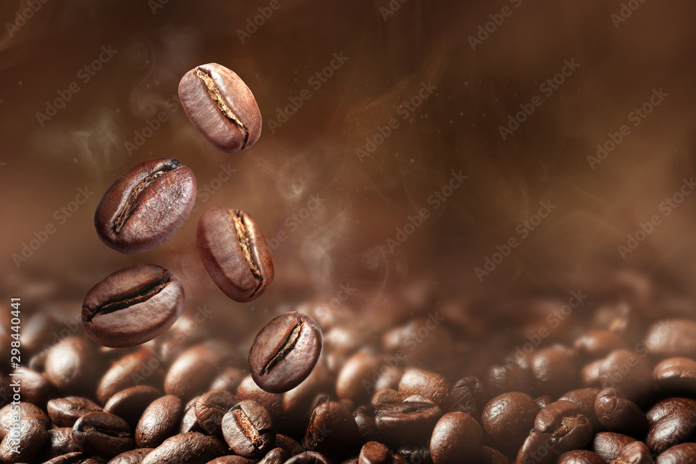 Roasted coffee beans on grey background, closeup - obrazy, fototapety, plakaty 