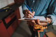 © Yakobchuk Olena - Making notes at repair work stock photo