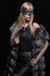 © Sergey Sukhorukov - Young beautiful blonde in a mask