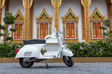 Retro Scooter In The Thai Temple