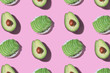 Avocado toast with avocado slice pattern on pink background. Food pattern with sunlight. Healthy food minimal concept