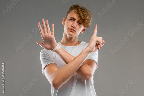 A portrait of young caucasian man with short red curly hair in white t-shirt sho Tableau sur Toile