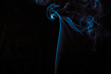 Smoke on a black background. Abstraction.