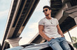 © Vasyl - Handsome man near car