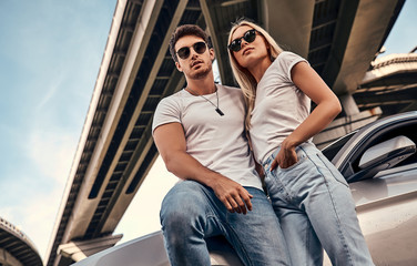 Couple near car