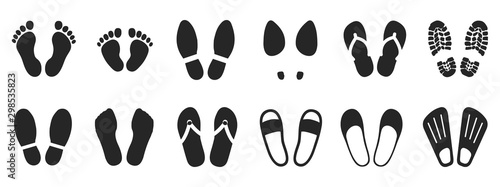 Set footprints and shoeprints icons - stock vector Tableau sur Toile
