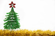 Green wire Christmas tree with golden tinsel