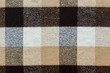 © Илья Подопригоров - Brown checkered wool plaid fabric texture. tartan texture
