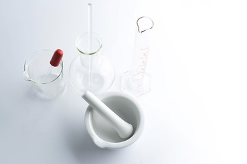 Wall Mural - laboratory glassware with water and empty