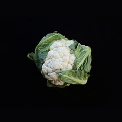 Fresh cauliflower isolated on black background with clipping path