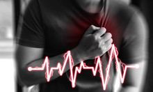 Heart Attack.Man Clutching His Chest From Acute Pain.having Heart Attack Or Painful Cramps, Pressing On Chest