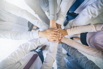 Fototapete - Stack of hands. Unity and teamwork concept.