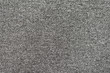 Seamless generic grey carpet background texture.