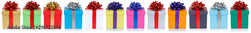 Fotografía Group of christmas presents birthday gifts in a row isolated on white