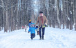 © alexkich - family walks on Winter Park during the weekend