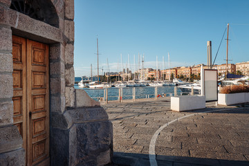 Wall Mural - CAGLIARI, ITALY /OCTOBER 2019: view of the port st sunset