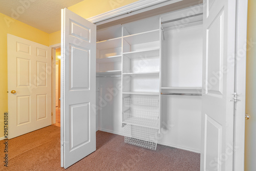 Fotografía Empty white built in closet or wardrobe interior