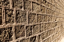 Stone Wall, Sandy Square Texture. Background For Design, Close-up, Jerusalem.