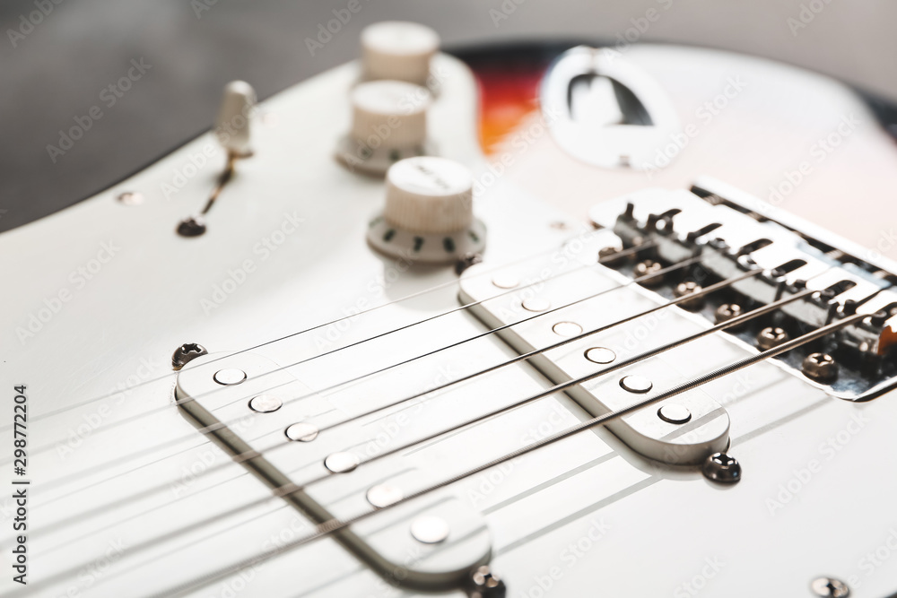 Modern bass guitar, closeup view