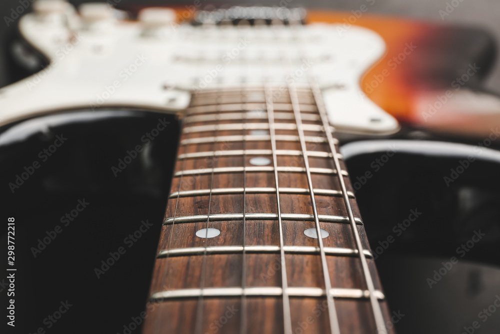 Modern bass guitar, closeup view