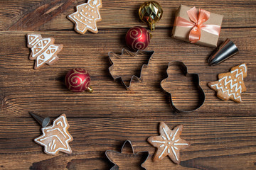 Wall Mural - Handmade cookies gift box on a dark wooden dark background. The concept of preparing for the holidays New Year and Christmas.