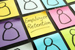 © Vitalii Vodolazskyi - Employee retention sign and figurines on the memo sticks.