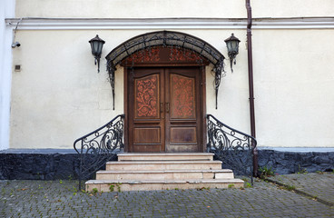 Wall Mural - Old vintage wall with worn wooden door