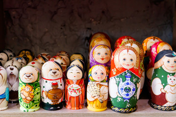 Wall Mural - Traditional souvenirs from Russia - colorful nesting dolls, also known as matryoshka, babushka, stacking dolls, or Russian dolls