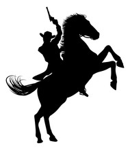 A Cowboy Riding A Horse In Silhouette Waving Pistol In The Air
