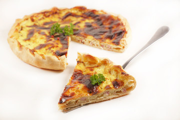 Wall Mural - quiche and slice isolated on white background