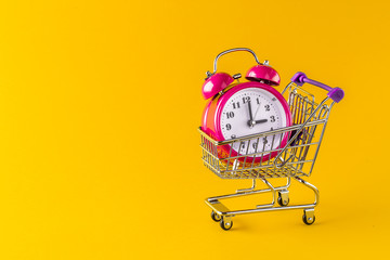 alarm clock and mini trolley cart with space copy