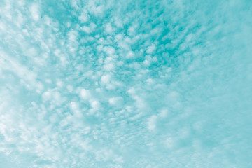 Wall Mural - Vintage abstract summer background,  Turquoise color sky and moving white cloud