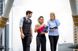 © FotoArtist - Business People Walking Together with hand holding book and folder at outdoor